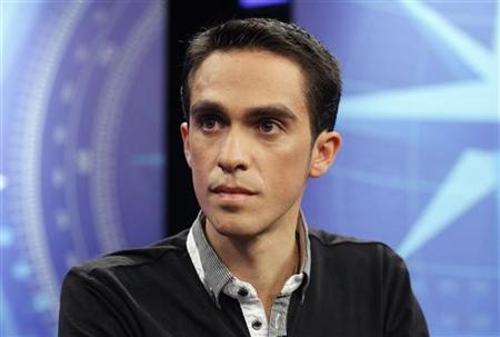 
Tour de France champion Alberto Contador waits for the start of an interview at a television studio near Madrid February 15, 2011. REUTERS/Andrea Comas
