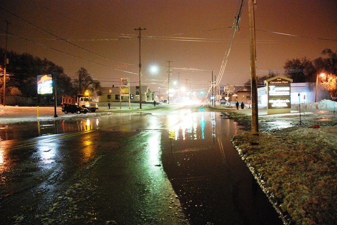 A water main break off West Main near Berkley in Kalamazoo closes several blocks and interrupts water service. Photos by Sean Patrick Duross.
