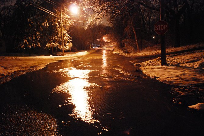 A water main break off West Main near Berkley in Kalamazoo closes several blocks and interrupts water service. Photos by Sean Patrick Duross.