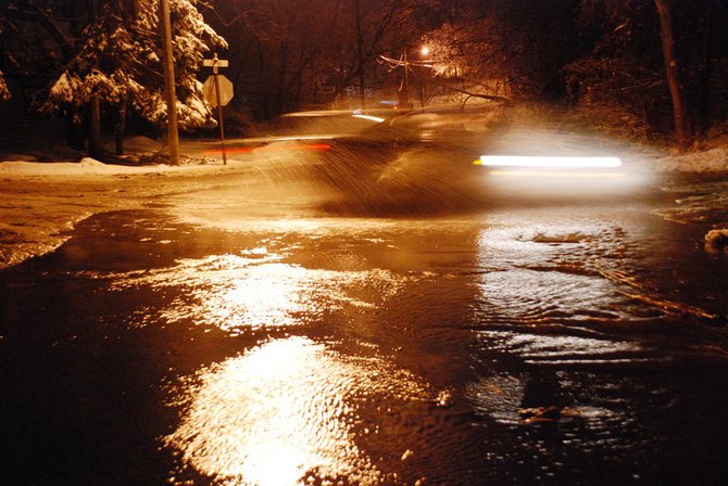 A water main break off West Main near Berkley in Kalamazoo closes several blocks and interrupts water service. Photos by Sean Patrick Duross.