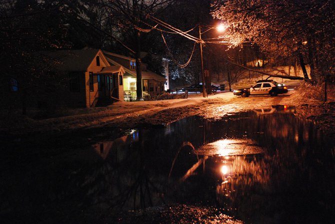 A water main break off West Main near Berkley in Kalamazoo closes several blocks and interrupts water service. Photos by Sean Patrick Duross.