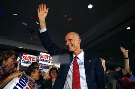 Florida Republican gubernatorial candidate Rick Scott waves to the crowd near the end of his victory rally in Ft Lauderdale, Florida, November 3, 2010. REUTERS/Andrew Innerarity
Florida Republican gubernatorial candidate Rick Scott waves to the crowd near the end of his victory rally in Ft Lauderdale, Florida, November 3, 2010. REUTERS/Andrew Innerarity