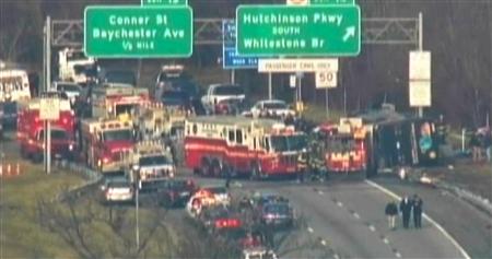 
A general view of a bus crash is seen on Interstate 95 in New York in this still image taken from video March 12, 2011. REUTERS/Courtesy of WNBC-TV/Handout
