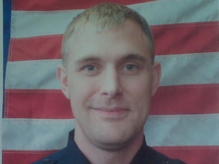 One Fond du Lac police officer was killed when a man inside a home on the city's west side began firing. Police Chief Tony Barthuly says 28-year-old Officer Craig Birkholz was shot in the upper chest by the suspect and killed. (courtesy of FOX 11)