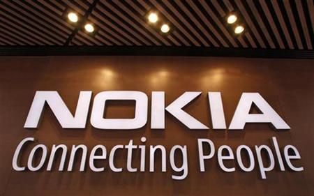 
A corporate logo is displayed at the Nokia flagship store in Helsinki September 29, 2010. REUTERS/Bob Strong

