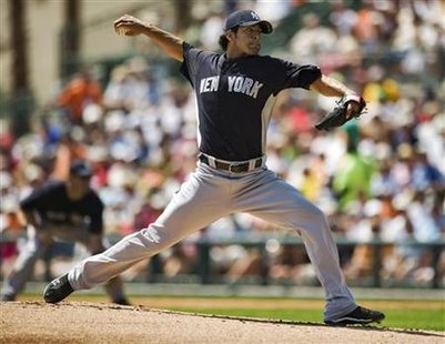 New York Yankees starter Sergio Mitre pitches against the Baltimore Orioles during the first inning of a MLB spring training game in Sarasota, Florida, March 22, 2011. REUTERS/Steve Nesius
New York Yankees starter Sergio Mitre pitches against the Baltimore Orioles during the first inning of a MLB spring training game in Sarasota, Florida, March 22, 2011. REUTERS/Steve Nesius