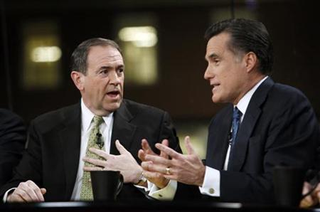 Republican presidential candidates, former Arkansas governor Mike Huckabee (R) and former Massachusetts Governor Mitt Romney, spar over the issue of tax cuts while they were governors during the Fox News Presidential Forum at Saint Anselm College in Manchester, New Hampshire January 6, 2008. REUTERS/Mike Segar
Republican presidential candidates, former Arkansas governor Mike Huckabee (R) and former Massachusetts Governor Mitt Romney, spar over the issue of tax cuts while they were governors during the Fox News Presidential Forum at Saint Anselm College in Manchester, New Hampshire January 6, 2008. REUTERS/Mike Segar