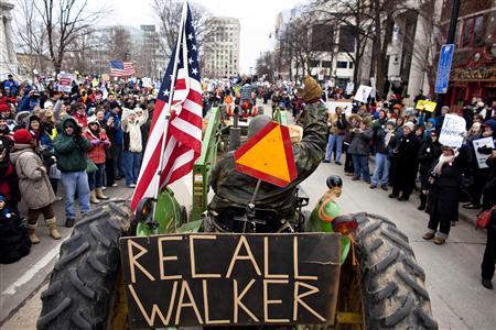 Protesters return to the Wisconsin State Capitol the day after Gov. Scott Walker (R-WI) signed the bill that eliminated almost all collective bargaining for most public workers at the state Capitol in Madison Wisconsin March 12, 2011. REUTERS/Darren Hauck Protesters return to the Wisconsin State Capitol the day after Gov. Scott Walker (R-WI) signed the bill that eliminated almost all collective bargaining for most public workers at the state Capitol in Madison Wisconsin March 12, 2011. REUTERS/Darren Hauck