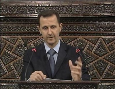 Syrian President Bashar Al-Assad addresses the parliament in Damascus in this still image taken from a video footage March 30, 2011. REUTERS/Syrian state TV via Reuters TV
Syrian President Bashar Al-Assad addresses the parliament in Damascus in this still image taken from a video footage March 30, 2011. REUTERS/Syrian state TV via Reuters TV