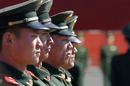 Paramilitary policemen attend a daily training session at the Forbidden City in central Beijing March 3, 2011. REUTERS/Petar Kujundzic
Paramilitary policemen attend a daily training session at the Forbidden City in central Beijing March 3, 2011. REUTERS/Petar Kujundzic