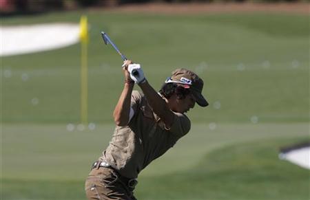 Ryo Ishikawa of Japan hits on the driving range during a practice round for the 2011 Masters golf tournament at the Augusta National Golf Club in Augusta, Georgia, April 3, 2011. REUTERS/Hans Deryk
Ryo Ishikawa of Japan hits on the driving range during a practice round for the 2011 Masters golf tournament at the Augusta National Golf Club in Augusta, Georgia, April 3, 2011. REUTERS/Hans Deryk