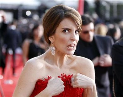 Actress Tina Fey adjusts her dress as she arrives at the 17th annual Screen Actors Guild Awards in Los Angeles, California January 30, 2011. REUTERS/Lucas Jackson
Actress Tina Fey adjusts her dress as she arrives at the 17th annual Screen Actors Guild Awards in Los Angeles, California January 30, 2011. REUTERS/Lucas Jackson