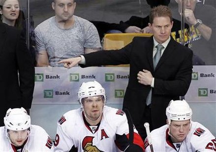 Ottawa Senators head coach Cory Clouston gives direction from the bench during the third period of their NHL hockey game against the Boston Bruins in Boston, Massachusetts April 9, 2011. REUTERS/Greg M Cooper
Ottawa Senators head coach Cory Clouston gives direction from the bench during the third period of their NHL hockey game against the Boston Bruins in Boston, Massachusetts April 9, 2011. REUTERS/Greg M Cooper