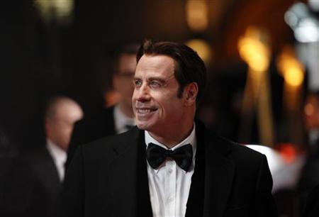U.S. actor John Travolta arrives on the red carpet for the 46th 'Goldene Kamera' (Golden Camera) awards ceremony at the Ullstein Auditorium in Berlin, February 5, 2011. REUTERS/Thomas Peter
U.S. actor John Travolta arrives on the red carpet for the 46th 'Goldene Kamera' (Golden Camera) awards ceremony at the Ullstein Auditorium in Berlin, February 5, 2011. REUTERS/Thomas Peter