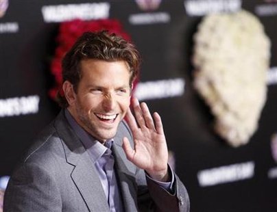 
Cast member Bradley Cooper gestures at the premiere of "Valentine's Day" at the Grauman's Chinese theatre in Hollywood, California February 8, 2010. REUTERS/Mario Anzuoni
