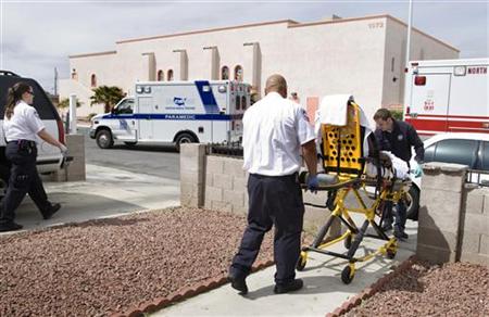 An American Medical Response (AMR) ambulance crew transports an ill woman to a hospital from her home in Las Vegas, Nevada, March 24, 2011. REUTERS/Steve Marcus
An American Medical Response (AMR) ambulance crew transports an ill woman to a hospital from her home in Las Vegas, Nevada, March 24, 2011. REUTERS/Steve Marcus