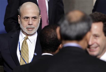 U.S. Federal Reserve Chairman Ben Bernanke attends the IMF governors family photo of the spring IMF-World Bank meetings in Washington April 16, 2011. REUTERS/Yuri Gripas
U.S. Federal Reserve Chairman Ben Bernanke attends the IMF governors family photo of the spring IMF-World Bank meetings in Washington April 16, 2011. REUTERS/Yuri Gripas