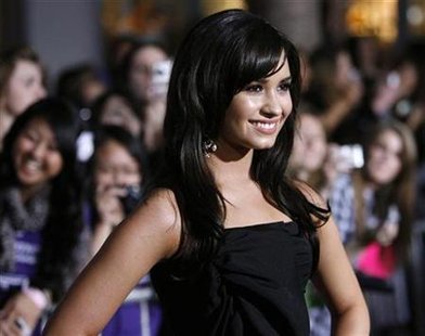 
Cast member Demi Lovato poses at the premiere of "Jonas Brothers: The 3D Concert Experience" at El Capitan theatre in Hollywood, California February 24, 2009. REUTERS/Mario Anzuoni
