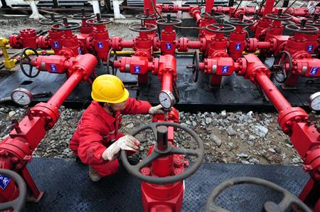A worker performs a routine check to the valves at a natural gas appraisal well of Sinopec in Langzhong county, Sichuan province, in this file picture taken March 1, 2011. Just over a year ago, Beijing awakened to a technology revolution that has unlocked massive reserves of gas trapped within shale rock formations in the United States. China's confidence has been bolstered by a new report of its estimated reserves of shale gas, which shows them
A worker performs a routine check to the valves at a natural gas appraisal well of Sinopec in Langzhong county, Sichuan province, in this file picture taken March 1, 2011. Just over a year ago, Beijing awakened to a technology revolution that has unlocked massive reserves of gas trapped within shale rock formations in the United States. China's confidence has been bolstered by a new report of its estimated reserves of shale gas, which shows them