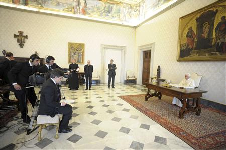 
Pope Benedict XVI sits during a video interview at the Vatican April 22, 2011. Pope Benedict took questions from a child in Japan, a Muslim woman in Ivory Coast and a mother caring for a son in a permanent coma in his first televised dialogue with the public, broadcast on Good Friday. REUTERS/Osservatore Romano

