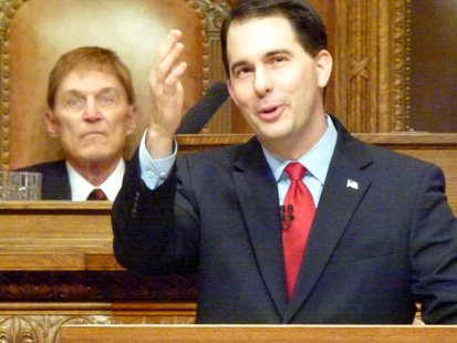 Governor Scott Walker (R) delivers the 2011 State of the State address. (Photo credit: Wisconsin Radio Network) Governor Scott Walker (R) delivers the 2011 State of the State address. (Photo credit: Wisconsin Radio Network)