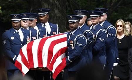 Catherine Stevens, widow of former Senator Ted Stevens (R-AK), walks behind the flag-draped casket during his burial ceremony at Arlington National Cemetery in Arlington, Virginia, September 28, 2010. REUTERS/Jim Young
Catherine Stevens, widow of former Senator Ted Stevens (R-AK), walks behind the flag-draped casket during his burial ceremony at Arlington National Cemetery in Arlington, Virginia, September 28, 2010. REUTERS/Jim Young