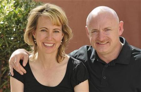 
U.S. Representative Gabrielle Giffords (D-AZ) and her husband, space shuttle astronaut Mark Kelly, are seen in an undated handout photo provided by her Congressional campaign, January 8, 2011. REUTERS/Giffords for Congress/PK Weis/Handout
