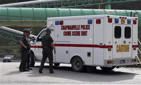 A crime scene search unit enters the main entrance to Upper Big Branch Mine in Montcoal, West Virginia, April 7, 2010. REUTERS/Mike Munden
A crime scene search unit enters the main entrance to Upper Big Branch Mine in Montcoal, West Virginia, April 7, 2010. REUTERS/Mike Munden