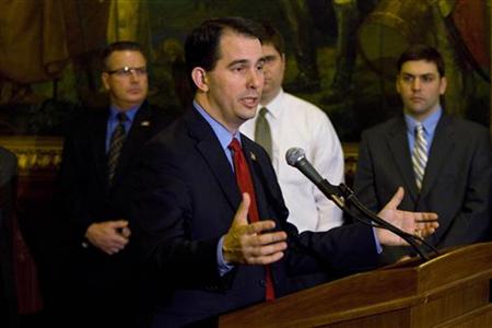 
Wisconsin State Governor Scott Walker speaks at the state Capitol in Madison, Wisconsin March 11, 2011.REUTERS/Darren Hauck
