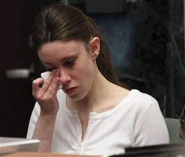 
Casey Anthony cries during her murder trial at the Orange County Courthouse in Orlando, Florida, May 24, 2011. REUTERS/Red Huber/Pool
