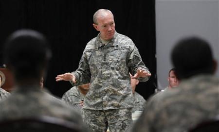 
U.S. Army Chief of Staff General Martin Dempsey meets with U.S. soldiers at Baghdad's Camp Victory April 20, 2011. REUTERS/Mohammed Ameen
