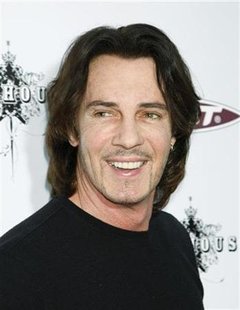 Musician Rick Springfield arrives at the premiere of "The Joneses" in Los Angeles, California, April 8, 2010. REUTERS/Jason Redmond
Musician Rick Springfield arrives at the premiere of "The Joneses" in Los Angeles, California, April 8, 2010. REUTERS/Jason Redmond