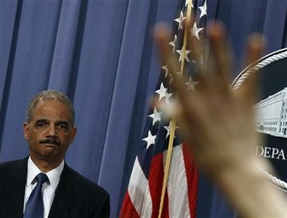 Attorney General Eric Holder listens to a question at a news conference to announce Medicare Fraud Strike Force law enforcement actions in Washington, February 17, 2011. REUTERS/Jim Young
Attorney General Eric Holder listens to a question at a news conference to announce Medicare Fraud Strike Force law enforcement actions in Washington, February 17, 2011. REUTERS/Jim Young