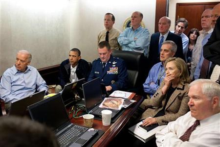 President Barack Obama (2nd L) and Vice President Joe Biden (L), along with members of the national security team, receive an update on the mission against Osama bin Laden in the Situation Room of the White House, May 1, 2011. Also pictured are Secretary of State Hillary Clinton (2nd R) and Defense Secretary Robert Gates (R). Please note: A classified document seen in this photograph has been obscured at source. Picture taken May 1, 2011. REUTER
President Barack Obama (2nd L) and Vice President Joe Biden (L), along with members of the national security team, receive an update on the mission against Osama bin Laden in the Situation Room of the White House, May 1, 2011. Also pictured are Secretary of State Hillary Clinton (2nd R) and Defense Secretary Robert Gates (R). Please note: A classified document seen in this photograph has been obscured at source. Picture taken May 1, 2011. REUTER