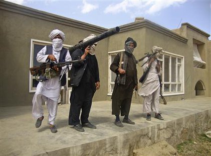 Taliban fighters pose with weapons at an undisclosed location in southern Afghanistan in this May 5, 2011 picture. REUTERS/Stringer
Taliban fighters pose with weapons at an undisclosed location in southern Afghanistan in this May 5, 2011 picture. REUTERS/Stringer
