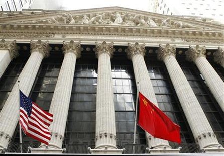 The flags of the United States and China hang outside of the New York Stock Exchange March 30, 2011. REUTERS/Lucas Jackson
The flags of the United States and China hang outside of the New York Stock Exchange March 30, 2011. REUTERS/Lucas Jackson