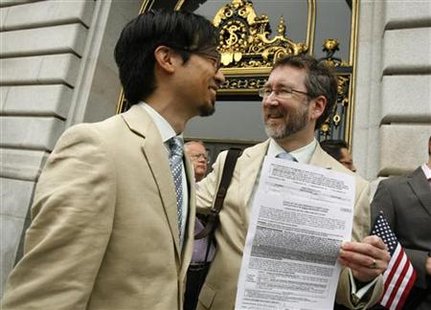 Same sex couple Thom Watson (R) and Jeff Tabaco show their marriage license application prior to a judge lifting the Proposition 8 stay on same sex marriages at City Hall in San Francisco, California August 12, 2010. REUTERS/Robert Galbraith
Same sex couple Thom Watson (R) and Jeff Tabaco show their marriage license application prior to a judge lifting the Proposition 8 stay on same sex marriages at City Hall in San Francisco, California August 12, 2010. REUTERS/Robert Galbraith