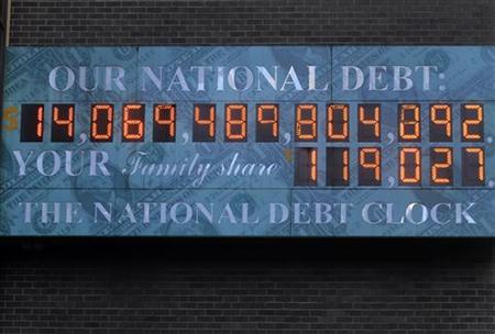 The National Debt Clock hangs from a building near Times Square in New York February 14, 2011. REUTERS/Joshua Lott
The National Debt Clock hangs from a building near Times Square in New York February 14, 2011. REUTERS/Joshua Lott