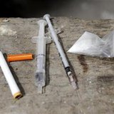 
Drugs and drug paraphernalia are seen in this file photo. REUTERS/Bor Slana
