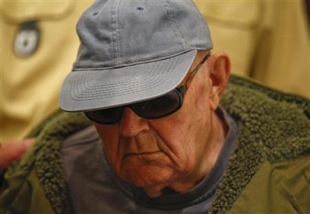 
Accused Nazi death camp guard John Demjanjuk arrives at a courtroom in Munich for his verdict on May 12, 2011. REUTERS/Michael Dalder
