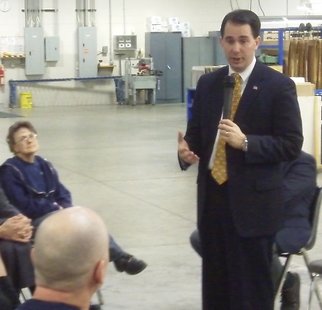 Governor Scott Walker speaks with workers at Wausau Container Corporation. Governor Scott Walker speaks with workers at Wausau Container Corporation.