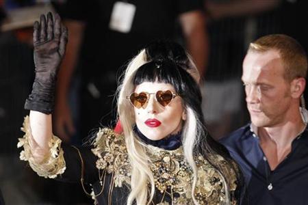 Singer Lady Gaga waves to fans after she performed on the Canal Plus television show "Le Grand Journal" in Cannes during the 64th Cannes Film Festival, May 11, 2011. REUTERS/Yves Herman
Singer Lady Gaga waves to fans after she performed on the Canal Plus television show "Le Grand Journal" in Cannes during the 64th Cannes Film Festival, May 11, 2011. REUTERS/Yves Herman