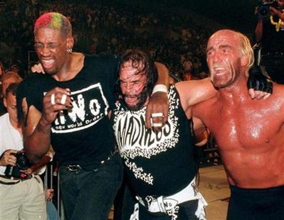Chicago Bulls forward Dennis Rodman (L) departs the ring with teammates Hulk Hogan (R) and "Macho Man" Randy Savage after they lost their World Championship Wrestling match in Daytona Beach, Florida in this July 14, 1997 file photo. REUTERS/Joe Skipper
Chicago Bulls forward Dennis Rodman (L) departs the ring with teammates Hulk Hogan (R) and "Macho Man" Randy Savage after they lost their World Championship Wrestling match in Daytona Beach, Florida in this July 14, 1997 file photo. REUTERS/Joe Skipper