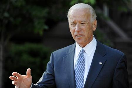 
Vice President Joe Biden talks to reporters as he departs after meeting with a bipartisan group of lawmakers to work on a legislative framework for comprehensive deficit reduction at the Blair House in Washington May 10, 2011. REUTERS/Jonathan Ernst
