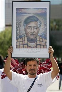 A man holds a photo of Cesar Chavez, the founder of the United Farm Workers, during an immigration rights rally at the Arizona State Capital in Phoenix, Arizona, September 4, 2006. REUTERS/Jeff Topping
A man holds a photo of Cesar Chavez, the founder of the United Farm Workers, during an immigration rights rally at the Arizona State Capital in Phoenix, Arizona, September 4, 2006. REUTERS/Jeff Topping