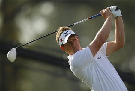 Luke Donald of England hits luke donald masters 2011. Luke Donald of England hits