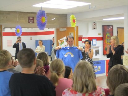 Governor Scott Walker receives a T-shirt from students at Franklin Elementary school in Wausau Governor Scott Walker receives a T-shirt from students at Franklin Elementary school in Wausau