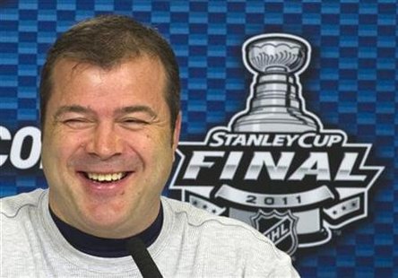 Vancouver Canucks head coach Alain Vigneault talks with media after player Manny Malhotra was cleared to play in Vancouver Vancouver Canucks head coach Alain Vigneault talks with media after player Manny Malhotra was cleared to play in Vancouver