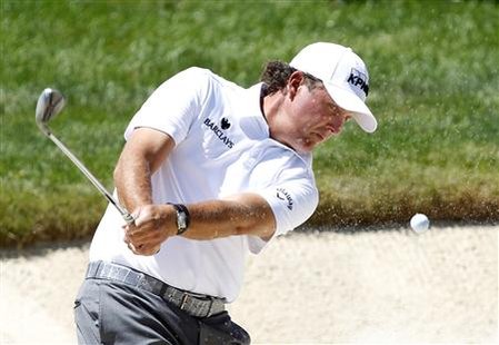 Mickelson of the U.S. hits from the sand on the 10th hole during a practice round for the Memorial Tournament in Dublin Mickelson of the U.S. hits from the sand on the 10th hole during a practice round for the Memorial Tournament in Dublin