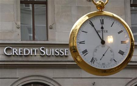 A giant watch displays the time in front of the logo of Swiss Credit Suisse bank at the Bahnhofstrasse in Zurich A giant watch displays the time in front of the logo of Swiss Credit Suisse bank at the Bahnhofstrasse in Zurich